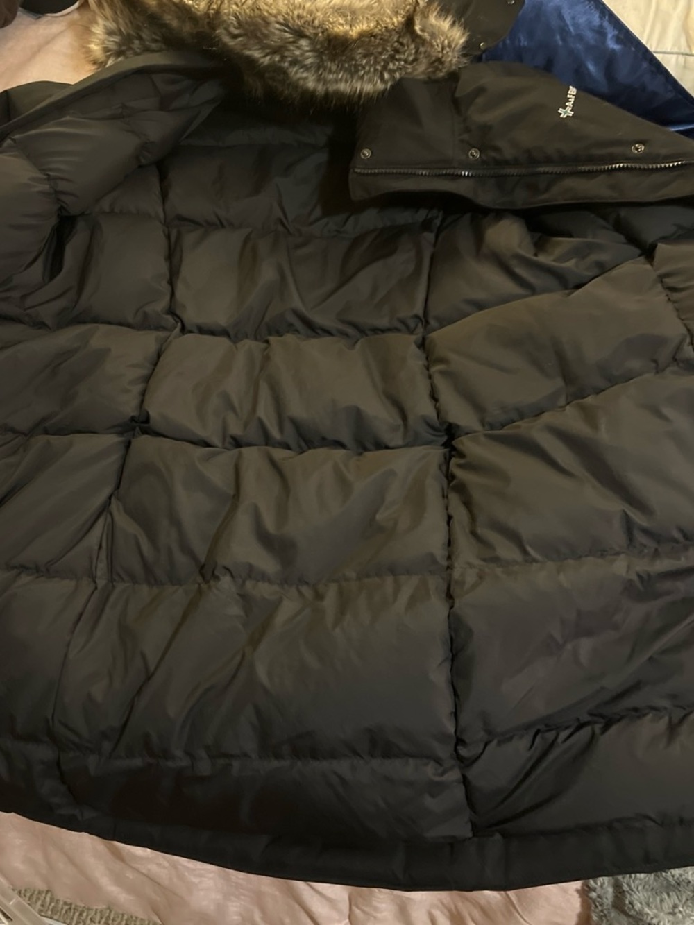 The North Face Black Quilted Down Puffer Jacket with Faux Fur Trim
